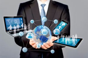 Businessman holds modern technology in hands